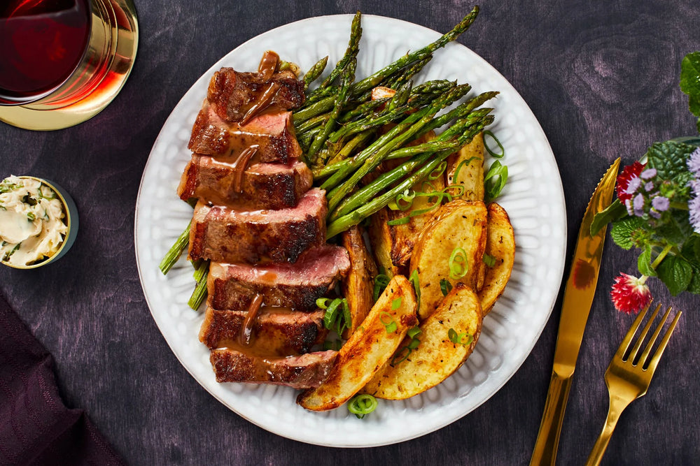 Truffled New York Strip Steak With Roasted Rosemary Potatoes and Asparagus 