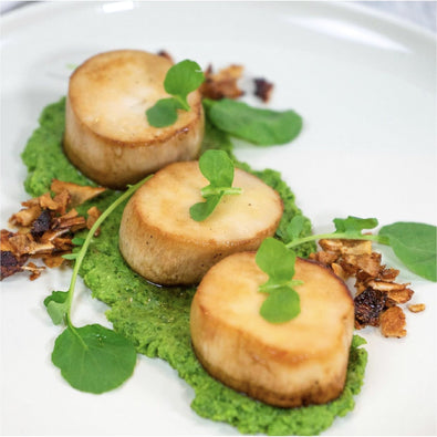 MUSHROOM SCALLOPS WITH TRUFFLE PEA PUREÉ AND COCONUT CHIP BACON BITS 